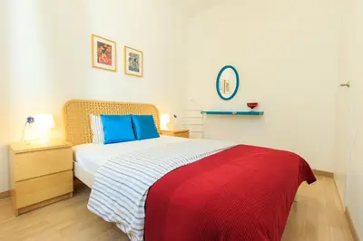 Łóżko lub łóżka w pokoju w obiekcie Rental Apartments Wilcza