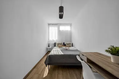 Łóżko lub łóżka w pokoju w obiekcie Rondo ONZ Apt - 11th Floor, Top location, Metro - by Rentujemy