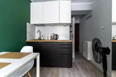 Kuchnia lub aneks kuchenny w obiekcie Close-Urban Chic -3 Bedrooms - Warsaw Stays - Ogrodowa