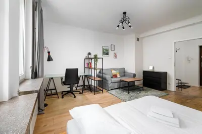 Część wypoczynkowa w obiekcie Grójecka City Gateway Apartment by BookingHost