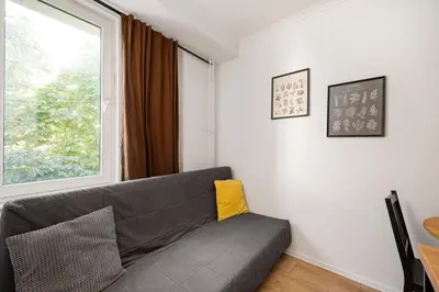 Część wypoczynkowa w obiekcie Grójecka City Gateway Apartment by BookingHost