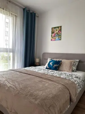 Łóżko lub łóżka w pokoju w obiekcie Apartament A191 by Real Apartment