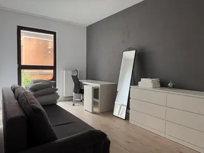 Część wypoczynkowa w obiekcie Metro Płocka Rooms