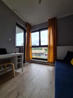 Część wypoczynkowa w obiekcie Metro Płocka Rooms