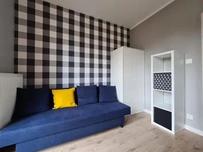 Część wypoczynkowa w obiekcie Metro Płocka Rooms