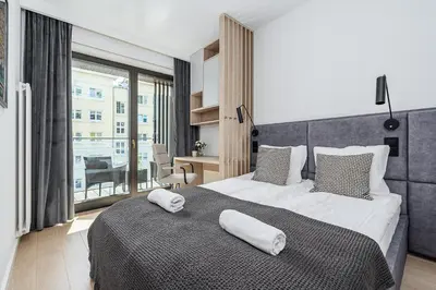 Łóżko lub łóżka w pokoju w obiekcie ShortStayPoland Dzielna Premium P5