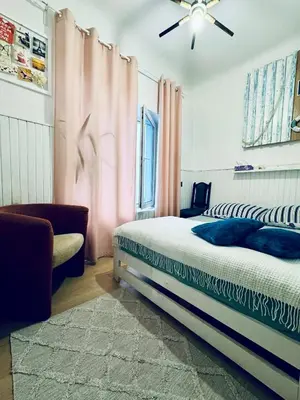 Łóżko lub łóżka w pokoju w obiekcie Warsaw downtown apartment