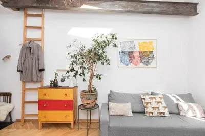 Łóżko lub łóżka w pokoju w obiekcie Boho Nest Warsaw - Cozy Studio