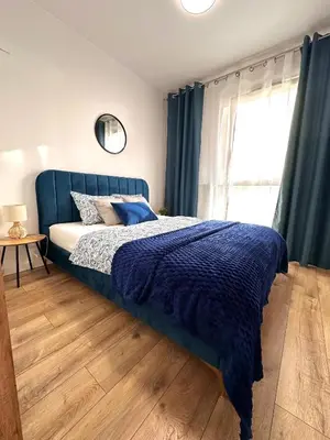 Łóżko lub łóżka w pokoju w obiekcie Apartment A106 by Real Apartment