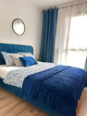 Łóżko lub łóżka w pokoju w obiekcie Apartment A106 by Real Apartment