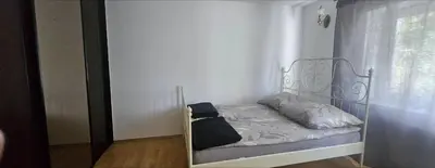 Łóżko lub łóżka w pokoju w obiekcie Noclegi Centrum