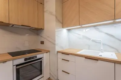 Kuchnia lub aneks kuchenny w obiekcie VipWarsawApartments Zircon Mennica Residence