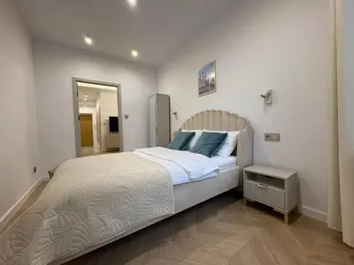 Łóżko lub łóżka w pokoju w obiekcie Old Town Dream