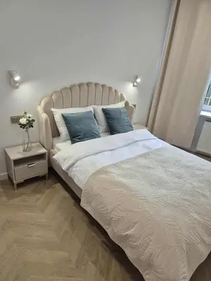 Łóżko lub łóżka w pokoju w obiekcie Old Town Dream