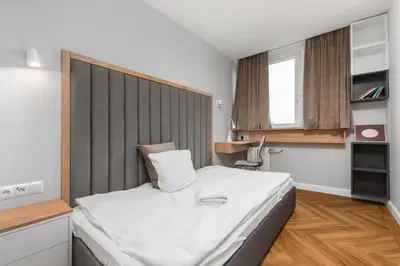 Łóżko lub łóżka w pokoju w obiekcie Bonifraterska 6 by Homeprime