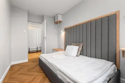 Łóżko lub łóżka w pokoju w obiekcie Bonifraterska 6 by Homeprime