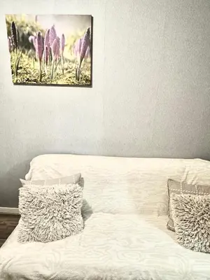 Łóżko lub łóżka w pokoju w obiekcie Powiśle Apartment