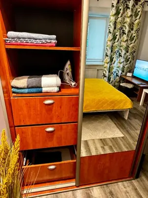 Łóżko lub łóżka w pokoju w obiekcie Powiśle Apartment