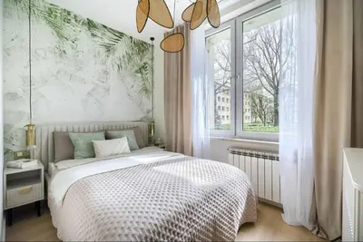 Łóżko lub łóżka w pokoju w obiekcie Kubańska by VAYA STAYS