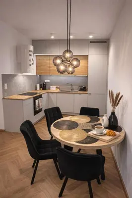 Kuchnia lub aneks kuchenny w obiekcie Designerski Apartament Wola - Parking Gratis - Klimatyzacja - Blisko Centrum - SmartTV