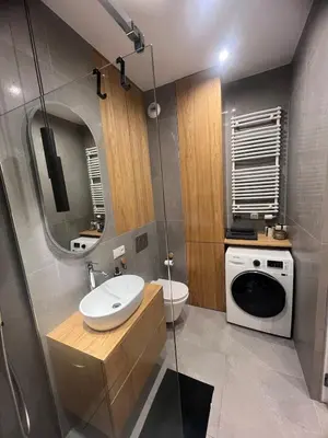 Łazienka w obiekcie Designerski Apartament Wola - Parking Gratis - Klimatyzacja - Blisko Centrum - SmartTV