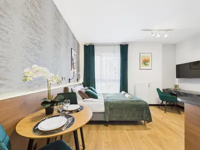 Telewizja i/lub zestaw kina domowego w obiekcie Marywilska 66A Comfort Studio by SuperApart with Parking