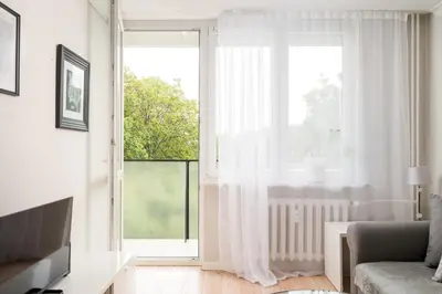 Część wypoczynkowa w obiekcie Afrykańska Deluxe Apartment by BookingHost