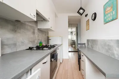 Kuchnia lub aneks kuchenny w obiekcie Afrykańska Deluxe Apartment by BookingHost