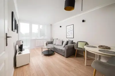 Część wypoczynkowa w obiekcie Afrykańska Deluxe Apartment by BookingHost