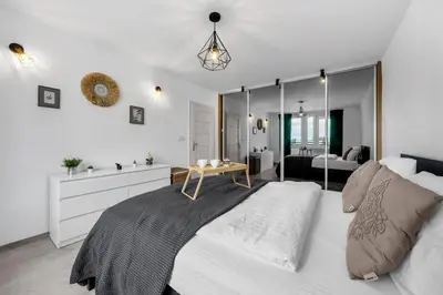 Łóżko lub łóżka w pokoju w obiekcie Gocław Apartment - 48m2, Balcony - by Rentujemy