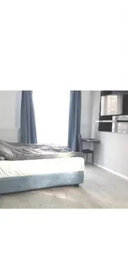 Łóżko lub łóżka w pokoju w obiekcie KOMFORT NOCLEGI - delux&standard rooms