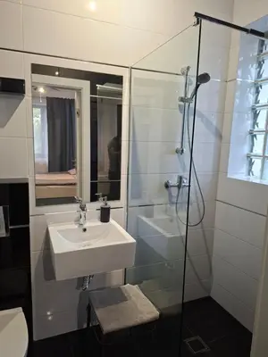 Łazienka w obiekcie KOMFORT NOCLEGI - delux&standard rooms