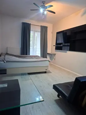 Łóżko lub łóżka w pokoju w obiekcie KOMFORT NOCLEGI - delux&standard rooms