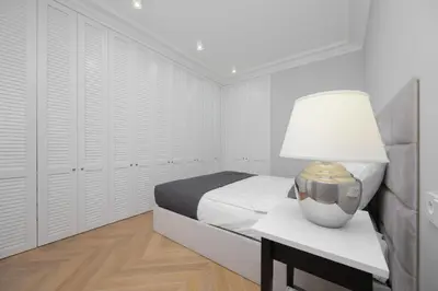 Łóżko lub łóżka w pokoju w obiekcie Jaktorowska Soft Apartment Warsaw by Solarento