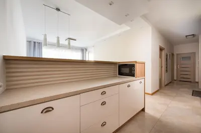 Kuchnia lub aneks kuchenny w obiekcie Warsaw Urban Living Apartment by BookingHost