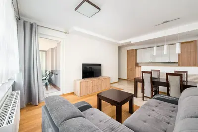 Telewizja i/lub zestaw kina domowego w obiekcie Warsaw Urban Living Apartment by BookingHost