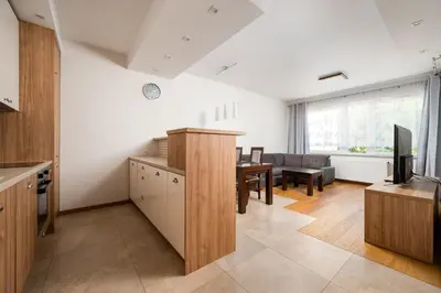 Telewizja i/lub zestaw kina domowego w obiekcie Warsaw Urban Living Apartment by BookingHost