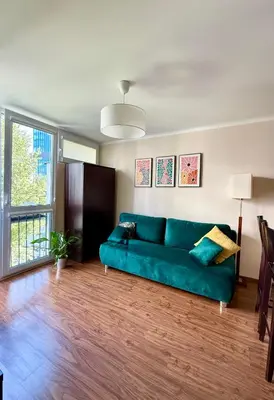 Część wypoczynkowa w obiekcie Cozy Stay Jana Pawła II Avenue Apartment