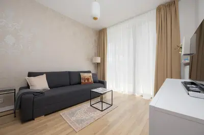 Telewizja i/lub zestaw kina domowego w obiekcie Elegant apartment near Paley and Medicover-Handelsmana 1st