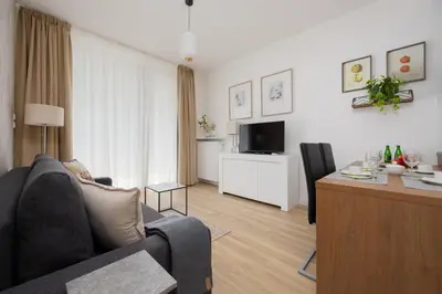 Telewizja i/lub zestaw kina domowego w obiekcie Elegant apartment near Paley and Medicover-Handelsmana 1st