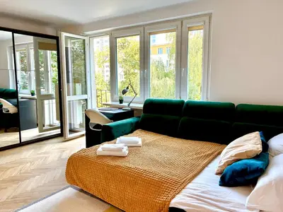 Łóżko lub łóżka w pokoju w obiekcie Best Life Apartment