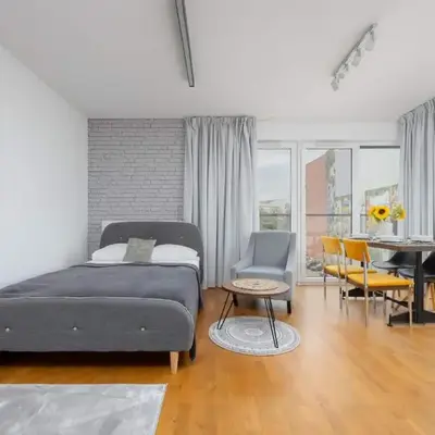 Bright Apartment Okrzei in Warsaw Near PGE by Noclegi Renters