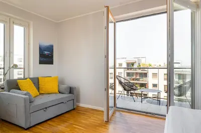 Część wypoczynkowa w obiekcie Las Bródnowski Urban Jungle Apartment by BookingHost