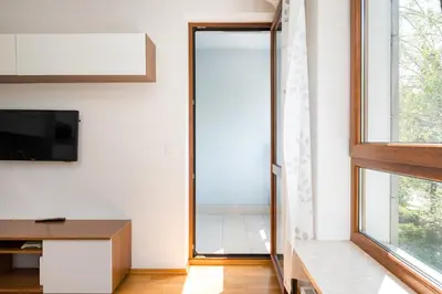 Telewizja i/lub zestaw kina domowego w obiekcie Namysłowska Cosy Apartment by BookingHost