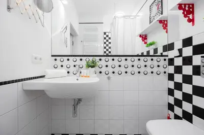 Łazienka w obiekcie American Retro Apartment with Balcony Warsaw Powiśle by Noclegi Renters