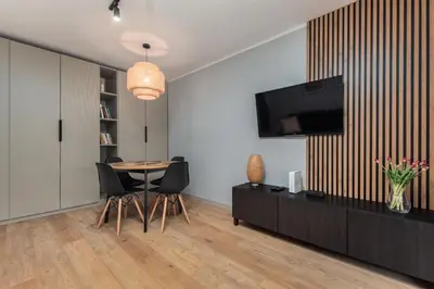 Telewizja i/lub zestaw kina domowego w obiekcie Bełska 6 by Homeprime