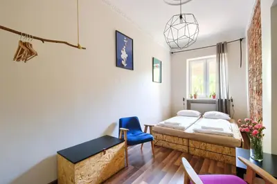 Łóżko lub łóżka w pokoju w obiekcie Lull Hostel