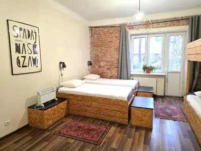 Łóżko lub łóżka w pokoju w obiekcie Lull Hostel