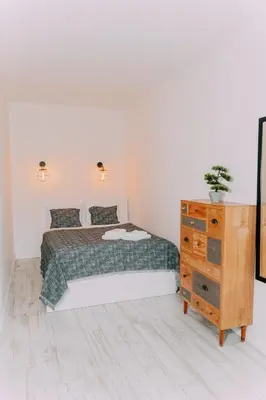 Łóżko lub łóżka w pokoju w obiekcie TourFlat21