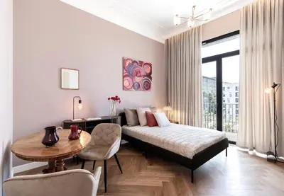 Łóżko lub łóżka w pokoju w obiekcie SOHO by VAYA STAYS